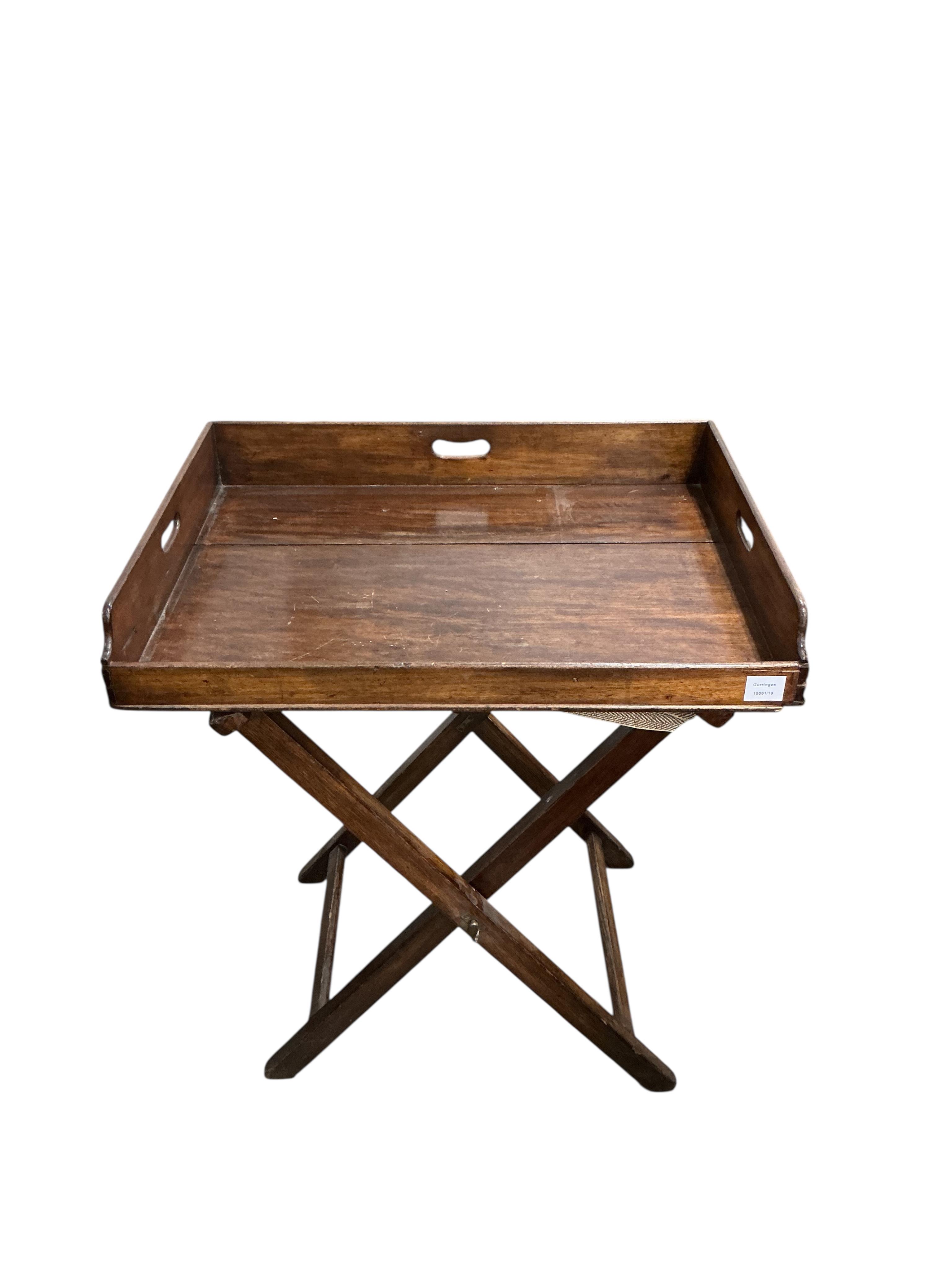 A Victorian rectangular mahogany butler’s tray on folding stand, width 74cm, depth 56cm, height 84cm